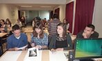 Učastníci konferenie pri praci v skole
